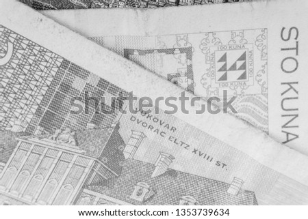 Croatian KUNA or STO KUNA money bank notes closeup. Selective focus and crop fragment. Black and White