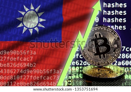 Taiwan flag and rising green arrow on bitcoin mining screen and two physical golden bitcoins