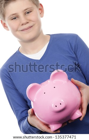 boy with pink piggybank on white background