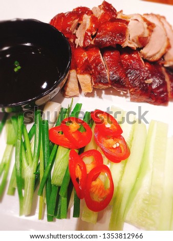 Food prepared from duck meat that is grilled with heat