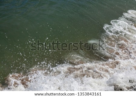Sea surf, close-up, background