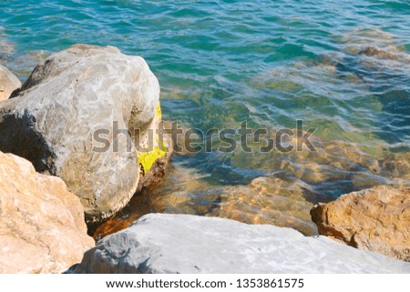 mountain blocks on the rocky coast of the sea