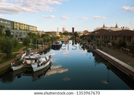 One of London's canals on a sunny day. Royalty-Free Stock Photo #1353967670