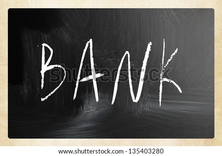 The word "Bank" handwritten with white chalk on a blackboard