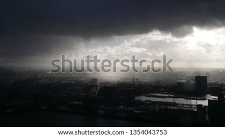 Rain cloud with sunshine in Rotterdam