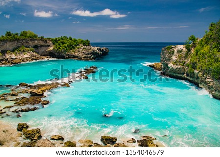 Paradise beach in Bali, blue lagoon, golden sand. Royalty-Free Stock Photo #1354046579