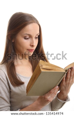 Young woman reading a book, isolated