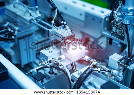 automatic system pneumatic input to robot handle in intelligence factory Royalty-Free Stock Photo #1354158074