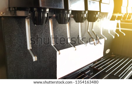 Self-service fresh soda, lemonade, root beer, sugar and sport drinks. Modern convenience store concept,selection of soft drinks Royalty-Free Stock Photo #1354163480