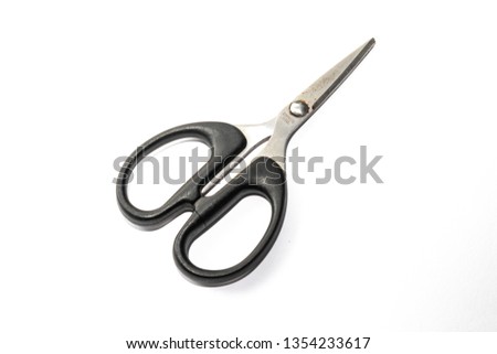 Black stainless scissor isolated on white background