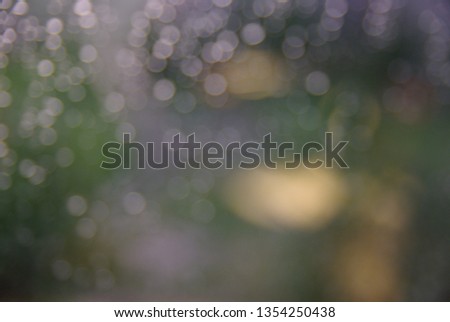 Raindrops on the glass. Blurred background.