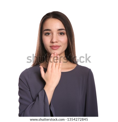 Woman showing THANK YOU gesture in sign language on white background