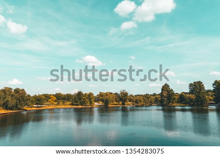 Spring Trees Reflections In Lake Of Tineretului Park In Bucharest, Romania. Royalty-Free Stock Photo #1354283075