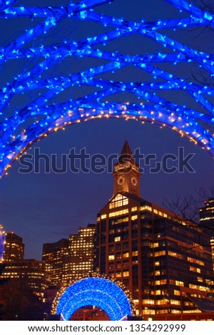 Holiday lights brighten a trellis in Boston