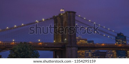 New York City Skyline At Dusk Viewing The Brooklyn Bridge And World Trade Center