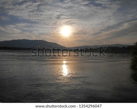 Sunset Lake Scene Royalty-Free Stock Photo #1354296047