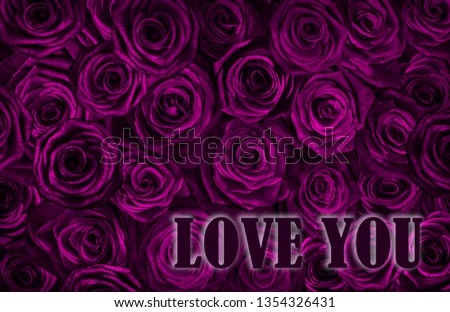 card love you with fresh pink roses . Greeting card with roses