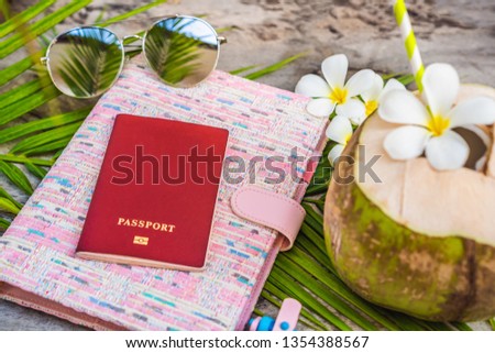 Notepad and stationery on wooden background. Planner for business and study. Fans of stationery. Travel planning notebook. Travel concept