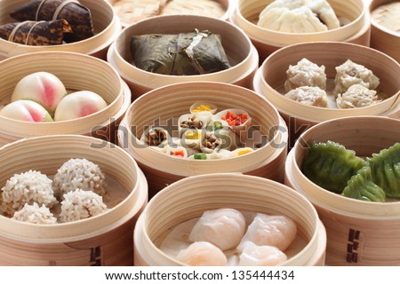 yumcha, dim sum in bamboo steamer, chinese cuisine Royalty-Free Stock Photo #135444434