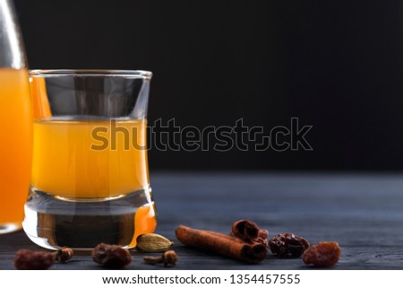 Honey alcohol drink in a glass.  Copy space