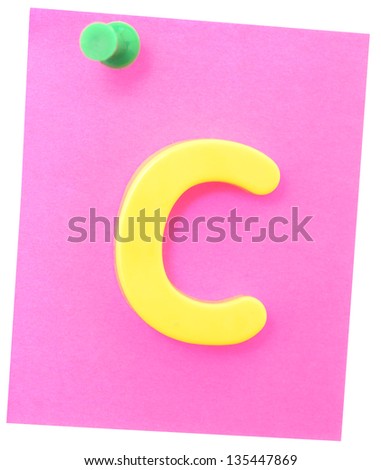 note with letter on clerical pin isolated on white