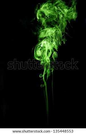 green smoke on black background Royalty-Free Stock Photo #135448553