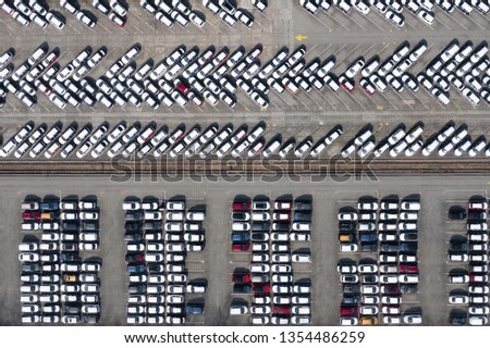 Aerial view new cars lined up in the port for import and export. 