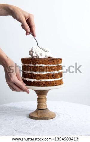 Delicious sliced carrot cake on white background with copy space