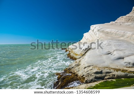 The Scala dei Turchi (Stair of the Turks), a spectacular white rocky cliff on the coast of Sicily, Italy. The rock formation in the shape of a staircase lies between two sandy beaches.