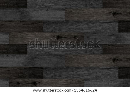 Natural dark oak parquet. Naturally aged wood. Flooring from old barn boards. Grey wood texture for background. Panel of boards for wall decoration.