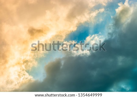 sunrise with clouds, light rays and other atmospheric effect