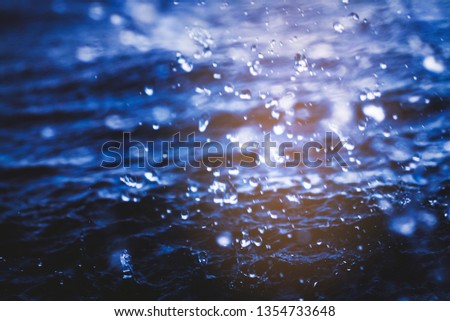 water surface background at sunset in summer