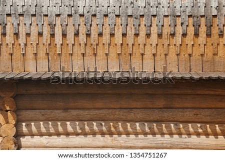 Wooden roof of shingle, close-up. Old building technologies