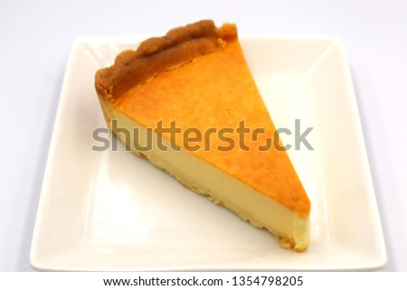 This is a picture of a baked cheese cake.