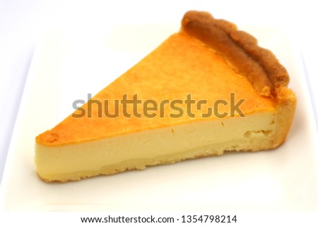 This is a picture of a baked cheese cake.