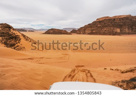 A beautiful landscape view of desert from of a car. Travel concept photography