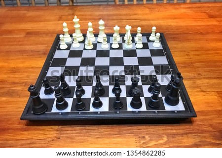 Chess board game on wood table