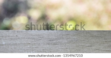 Gray wood on blurred bokeh nature background
