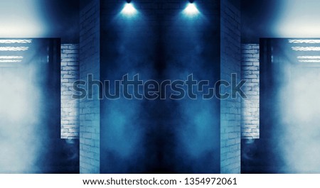 Background of empty dark room with brick walls, illuminated by neon lights with laser beams, smoke