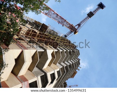 house develop with crane tower