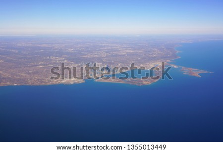 Aerial landscape view of the city of Toronto skyline and Lake Ontario in Ontario, Canada