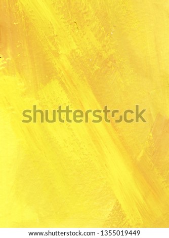 Macro texture of painted surface. Brush marks on the paint. Chaotic strokes of white, yellow, and ocher color. Sunny cheerful mood. handmade.