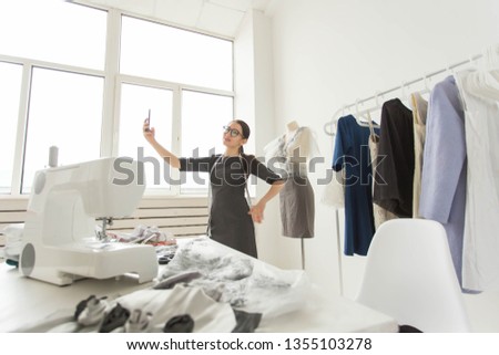 Dressmaker, technologies, fashion designer and tailor concept - Fashion designer taking selfies over mannequin background