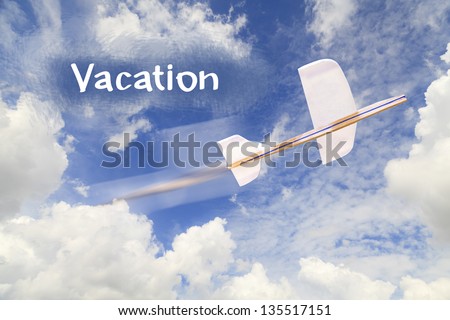 Airplane model on blue sky and Vacation text