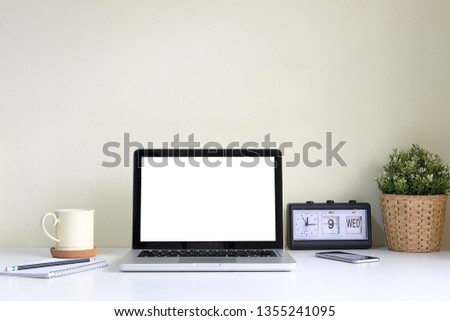 Workspace desk and mockup laptop. copy space and blank screen. Business image, Blank screen laptop and supplies. 