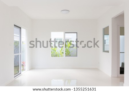 White tile floor and space in room clean and symmetry with grid line texture in perspective view for product display background, Square shape of white tile made from ceramic material covering floor.