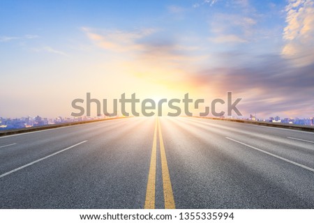 Straight asphalt highway passing through the city above in Hangzhou at night Royalty-Free Stock Photo #1355335994