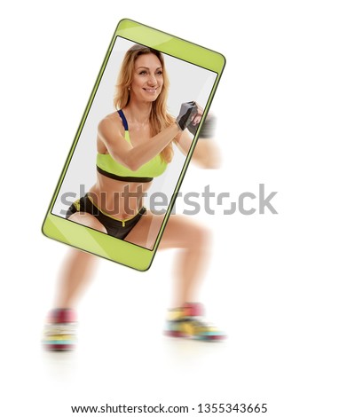 Photo of sporty athletic muscular woman in sportswear squatting. conceptual image with a smartphone, demonstration of device capabilities