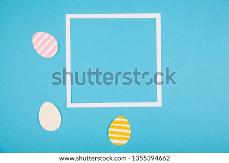 Creative layout for easter day with rabbit and color eggs