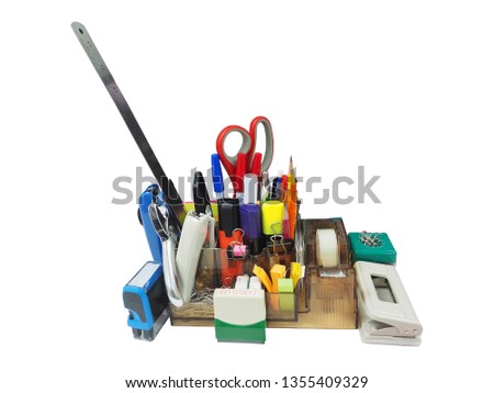 Rubber stamp,paper hole puncher ,tape dispenser cutter,stapler,binder clip,rubber stamp,Staple remover ,pencil sharpener,pens,ruler,pencils and paper clip box of office stationery isolate on white